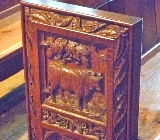 Carved pew end
