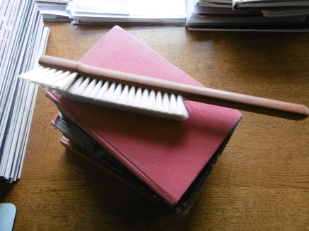 book brush and books